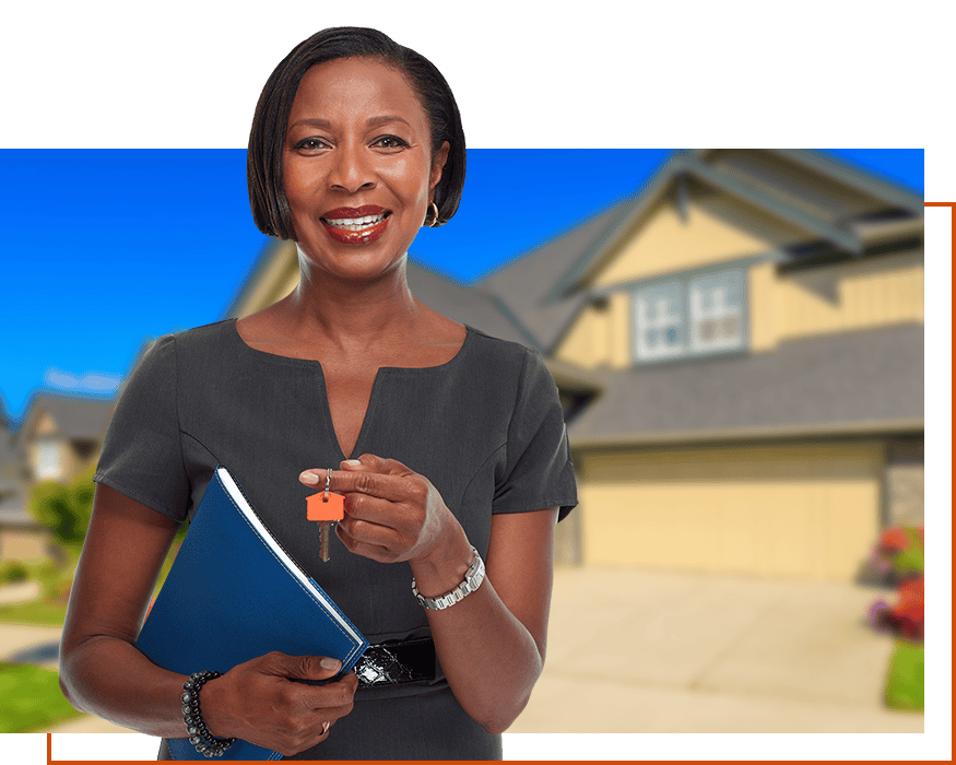 woman holding keys to a new home